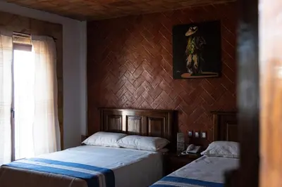 Cama o camas de una habitación en Hotel Casa Mixteca