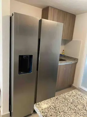 Una cocina o zona de cocina en Hermoso Apartamento con club de playa