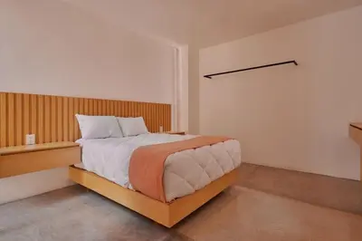 Cama o camas de una habitación en Hermosa casa ubicada en Oaxaca