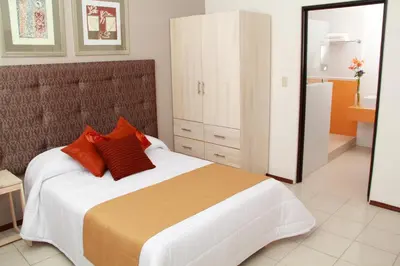 Cama o camas de una habitación en Hotel La Casa de María