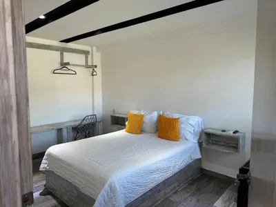 Cama o camas de una habitación en Hotel DABA