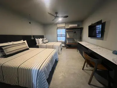 Cama o camas de una habitación en Lofts Marques Oaxaca