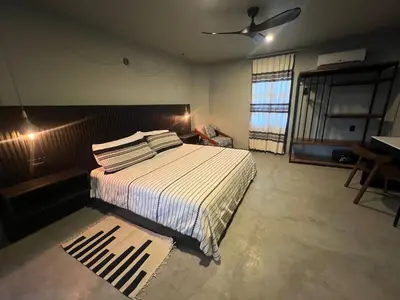Cama o camas de una habitación en Lofts Marques Oaxaca