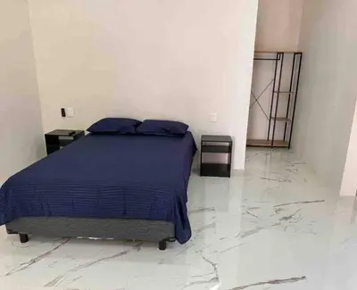Cama o camas de una habitación en Apartamento confortable y bien ubicado