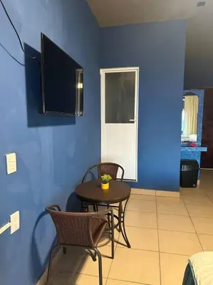 Una televisión o centro de entretenimiento en Brisa Del Mar #1
