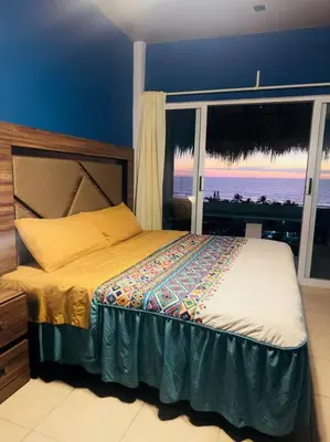 Cama o camas de una habitación en Brisa Del Mar #1