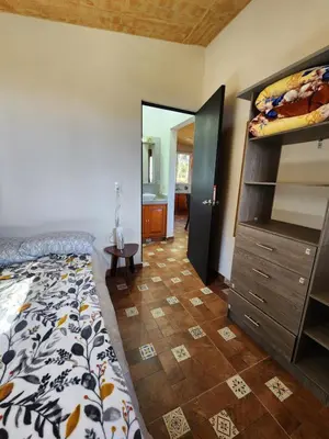 Cama o camas de una habitación en Chalet Bosque de Zacatlan II