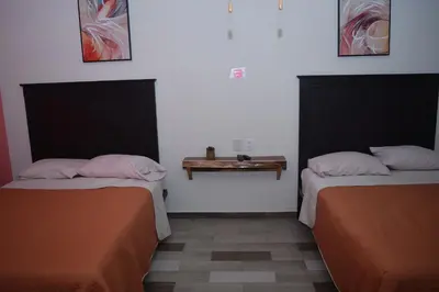Cama o camas de una habitación en Estancia Vacacional 20 Aguas