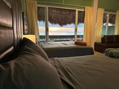 Cama o camas de una habitación en brisas del mar #3