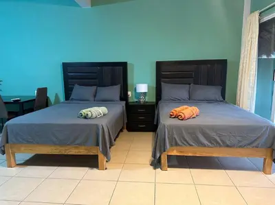 Cama o camas de una habitación en brisas del mar #3