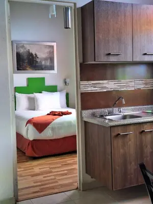 Cama o camas de una habitación en Hotel del Capitán de Puebla - Vitrales