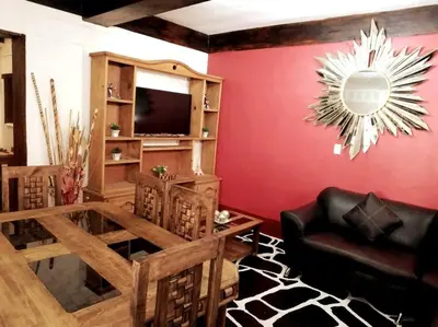 Una televisión o centro de entretenimiento en La cabaña del TIO PEPE