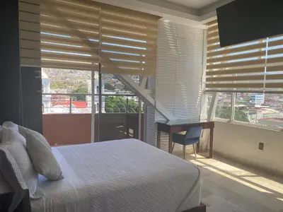 Cama o camas de una habitación en Hotel Zócalo Chilpancingo