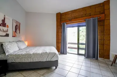 Cama o camas de una habitación en Cozy family house I Pool & Bar l Cuernavaca