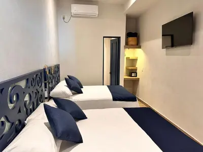 Cama o camas de una habitación en Centrico House
