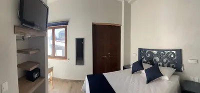 Cama o camas de una habitación en Centrico House