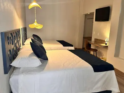Cama o camas de una habitación en Centrico House