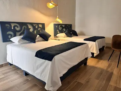 Cama o camas de una habitación en Centrico House