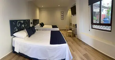 Cama o camas de una habitación en Centrico House