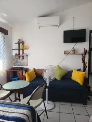 Zona de estar de Cómoda habitación Mar