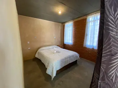 Cama o camas de una habitación en Cabaña Abigel