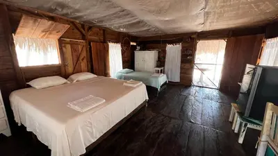 Cama o camas de una habitación en Cabañas Casa de Agua