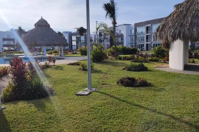 Jardín al aire libre en Depto. con club de Playa