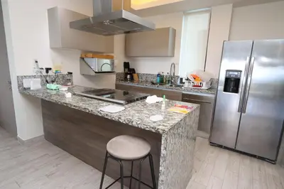 Una cocina o zona de cocina en Isla Residences, frente al mar.