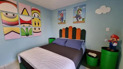 Cama o camas de una habitación en Departamento Zona Gamer Frente al Aeropuerto