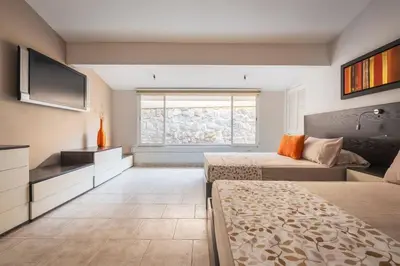 Cama o camas de una habitación en Exclusiva Residencia de Lujo con Alberca Privada