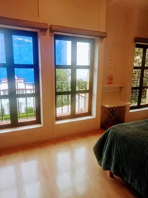 Cama o camas de una habitación en LA CASA DEL NARANJO
