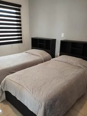 Cama o camas de una habitación en Grandioso Departamento en Teziutlán, Puebla