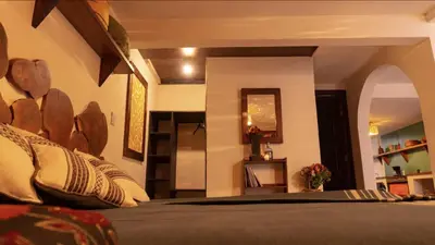 Cama o camas de una habitación en Con arte oaxaqueño a 15 min del centro
