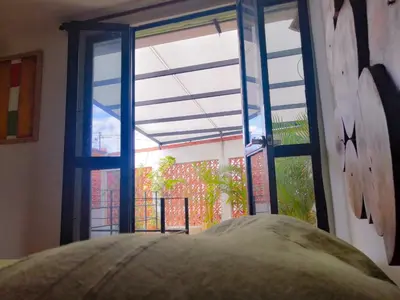 Cama o camas de una habitación en Con arte oaxaqueño a 15 min del centro