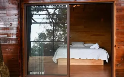 Cama o camas de una habitación en San José del Pacífico- Cabañas Camino al Cielo 3