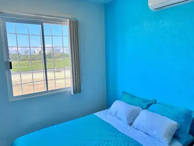 Cama o camas de una habitación en Casa en Acapulco diamante WIFI, Clima, Alberca