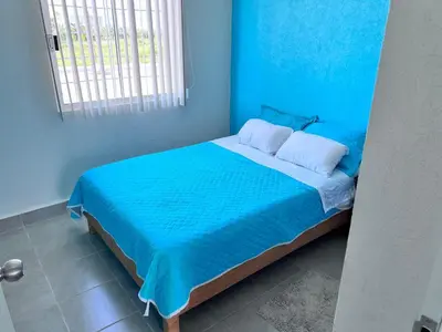 Cama o camas de una habitación en Casa en Acapulco diamante WIFI, Clima, Alberca