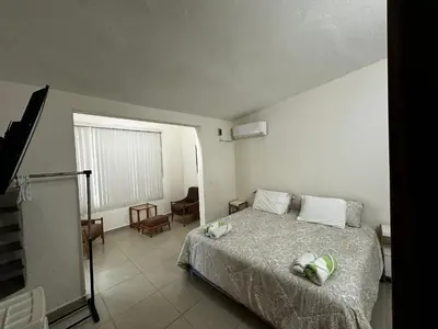 Cama o camas de una habitación en Las Casitas Puerto Arista