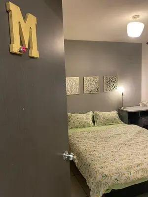 Cama o camas de una habitación en Exclusivas Habitaciones al Oriente