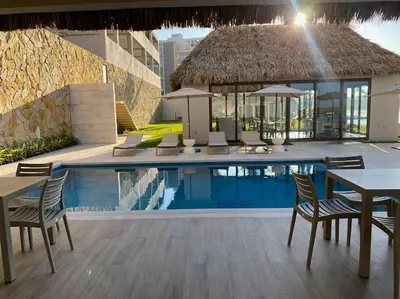 Piscina en o cerca de 9nopiso Vista al Mar con 3 Albercas con Gym y Playa