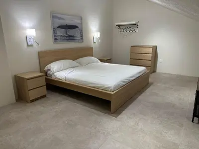 Cama o camas de una habitación en Departamentos Flamboyant