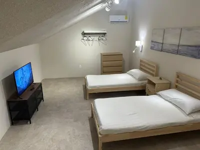 Una televisión o centro de entretenimiento en Departamentos Flamboyant