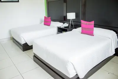 Cama o camas de una habitación en Chiapas Hotel Express, Tuxtla Gutierrez
