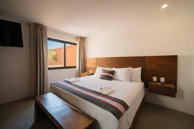 Cama o camas de una habitación en Punta Agave Suites