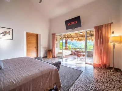 Cama o camas de una habitación en Casa Maka - Stunning Oceanfront Villa