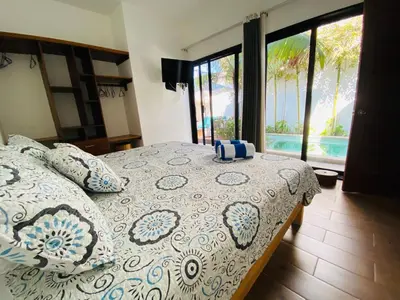 Cama o camas de una habitación en Oasis Villa a lado del mar