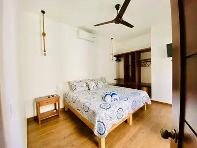 Cama o camas de una habitación en Oasis Villa a lado del mar
