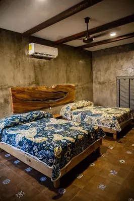 Cama o camas de una habitación en Casa Majeva Punta Conejo