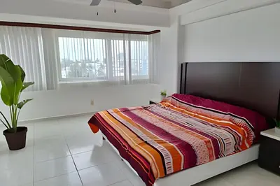 Plano de Departamento frente a la playa con Alberca