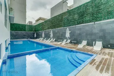 Piscina en o cerca de Spacious & comfortable Apt. w/pool by mYYcasa P-2